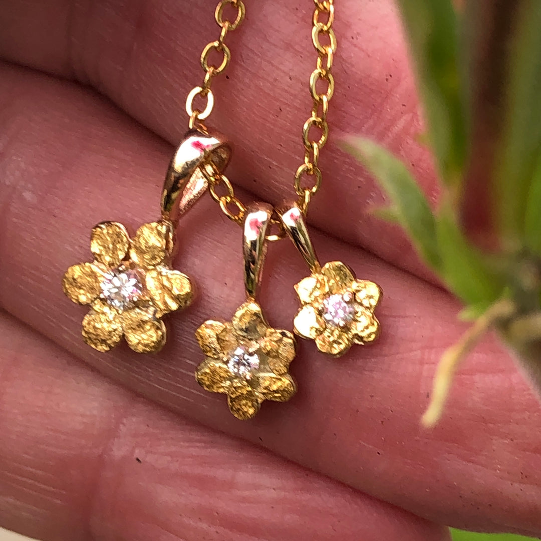 N310  Flower with Large 14kt & Nuggets with Diamond Pendant