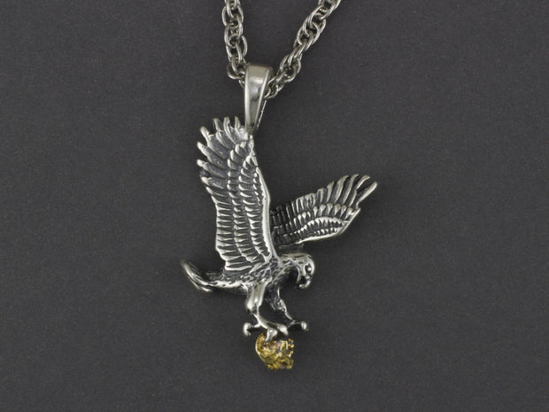 N045  Flying Silver Eagle Pendant Clutching a Gold Nugget